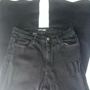 Fashion Nova black bootcut jeans with distressed knees